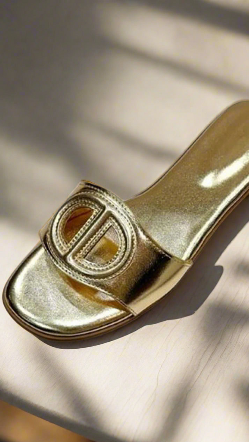 Gold Oval Buckle Cut-Out Slide Sandals.