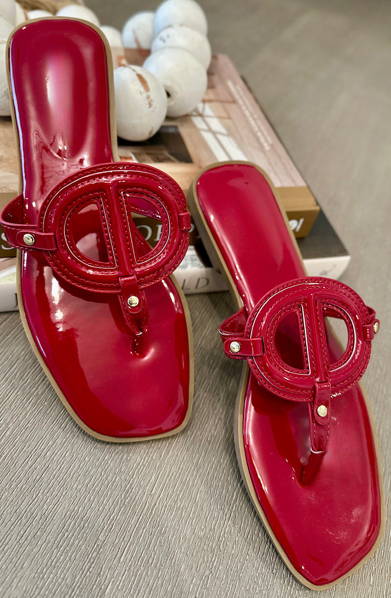 Glossy Emblem T-Strap Sandals